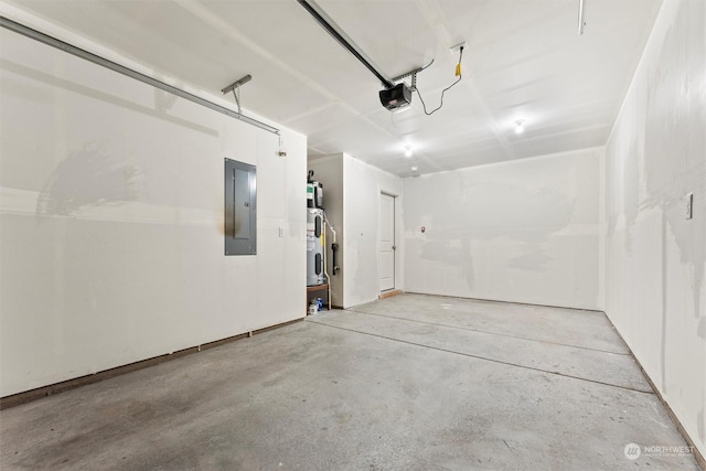 garage featuring electric panel and a garage door opener