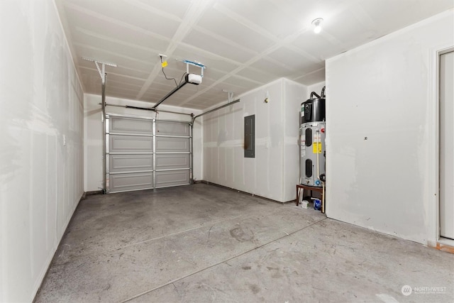 garage featuring hybrid water heater, electric panel, and a garage door opener