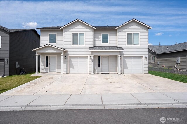 324326 W 6th St, Warden, WA 98857 - view of front of home featuring driveway, an attached garage, and a shingled roof
