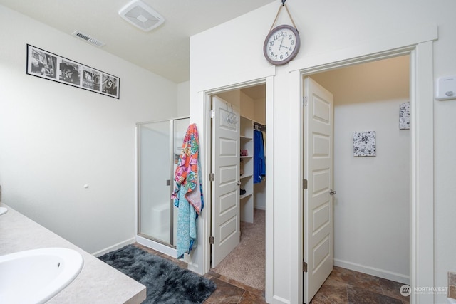 4719 Badger St, Moses Lake, WA 98837 - full bath with a spacious closet, a stall shower, and double vanity