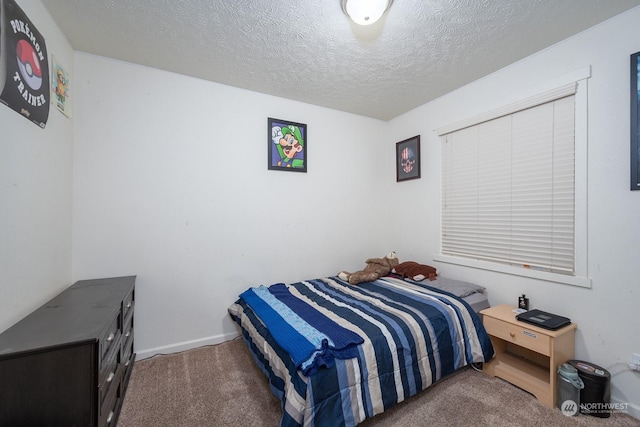 4719 Badger St, Moses Lake, WA 98837 - bedroom with carpet flooring and a textured ceiling