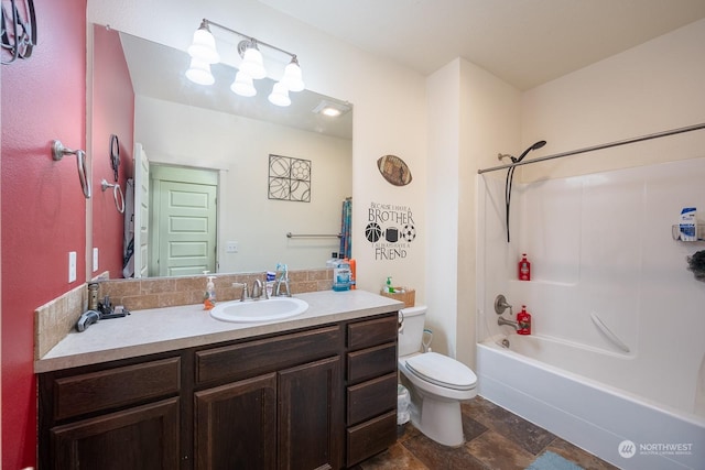 full bathroom featuring shower / washtub combination, vanity, and toilet