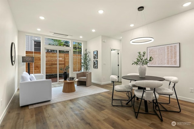 dining room featuring wood-type flooring