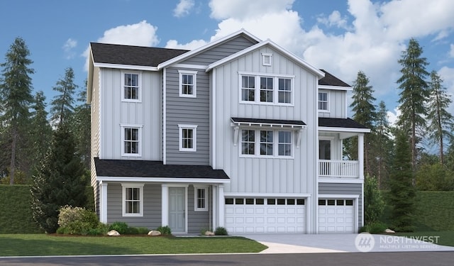 view of front of property with a garage and a front lawn