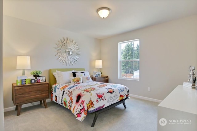 bedroom with light carpet