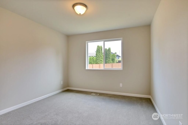 view of carpeted spare room