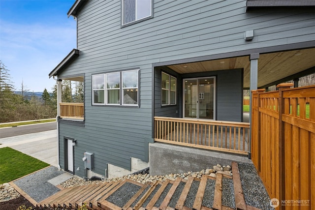 view of property exterior featuring a porch