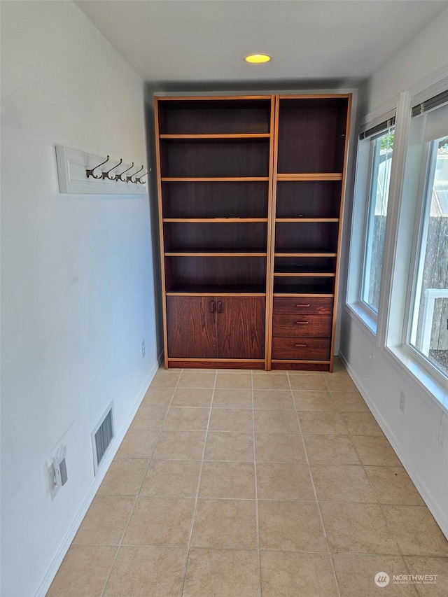 interior space featuring light tile patterned floors