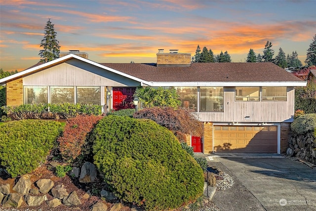 view of front of home with a garage