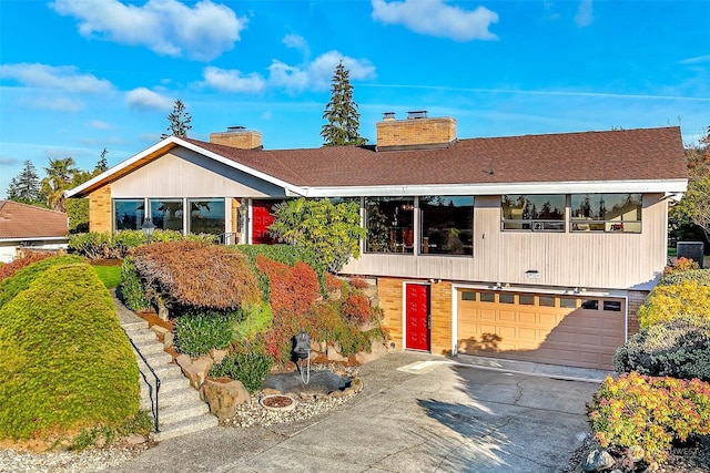 view of front of property with a garage