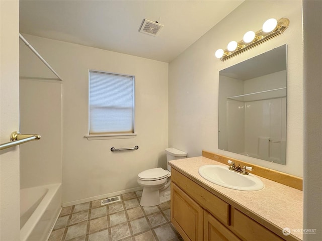 full bathroom featuring shower / tub combination, vanity, and toilet