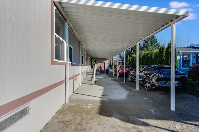 view of car parking featuring a carport