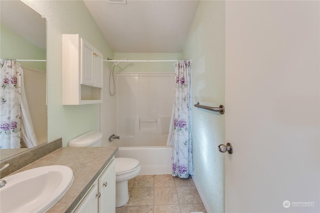 full bathroom featuring tile patterned flooring, shower / bath combo, toilet, and vanity