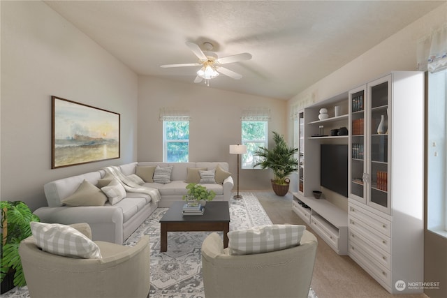 living room featuring light carpet, vaulted ceiling, and ceiling fan