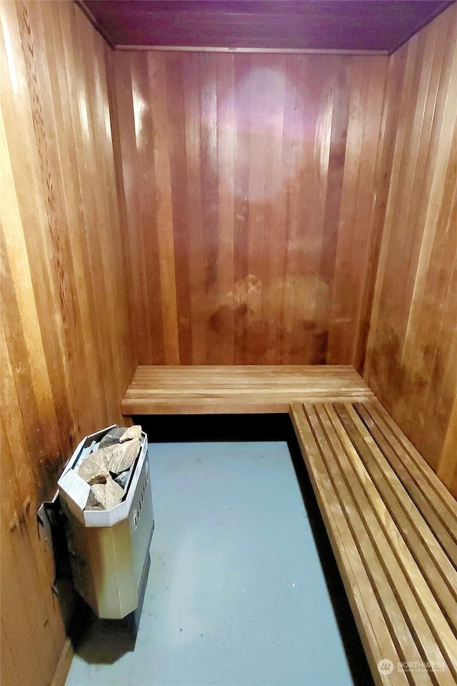 view of sauna / steam room featuring concrete flooring