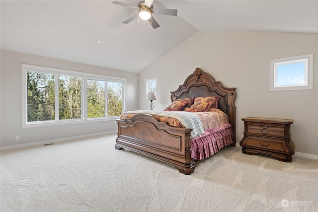 bedroom featuring ceiling fan, lofted ceiling, and carpet floors