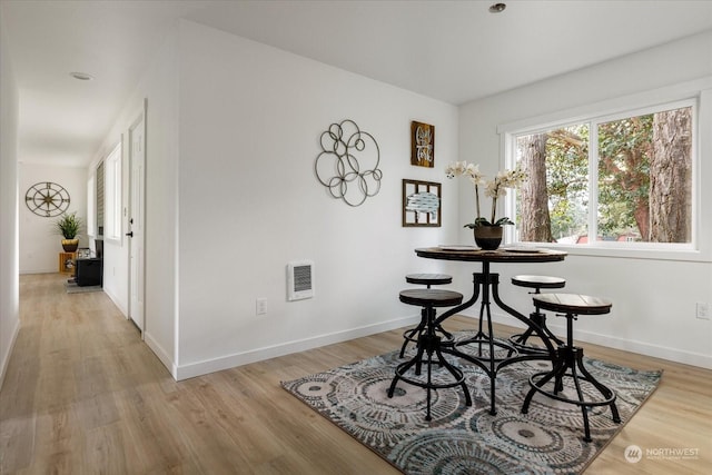 dining area featuring light hardwood / wood-style flooring