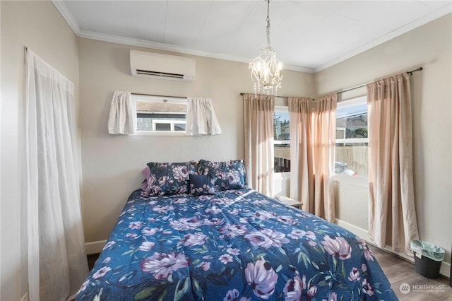 bedroom with a wall mounted AC, crown molding, an inviting chandelier, and hardwood / wood-style flooring