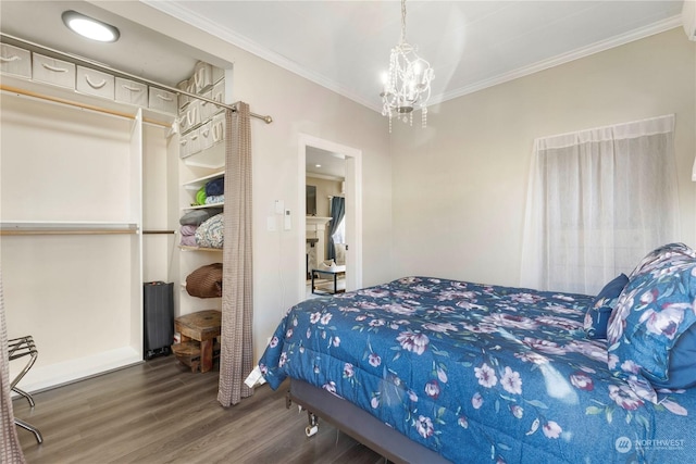 bedroom featuring hardwood / wood-style flooring and ornamental molding