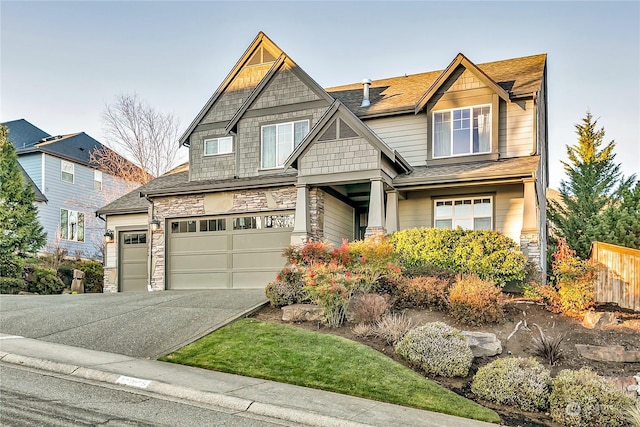 craftsman inspired home featuring a garage