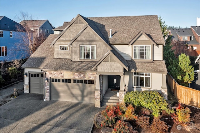 craftsman-style house featuring a garage