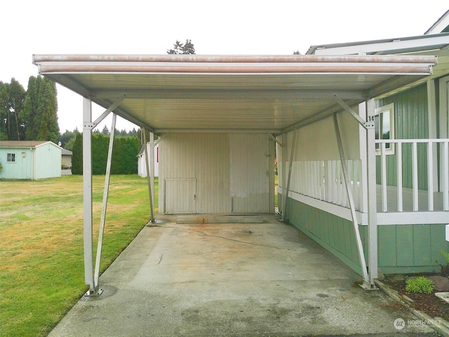 view of parking / parking lot with a carport and a lawn