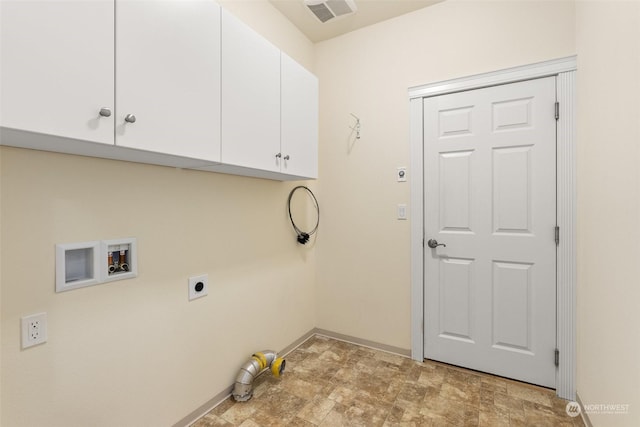 laundry area with hookup for an electric dryer, washer hookup, and cabinets