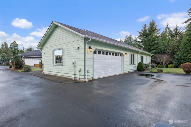 view of home's exterior featuring a garage