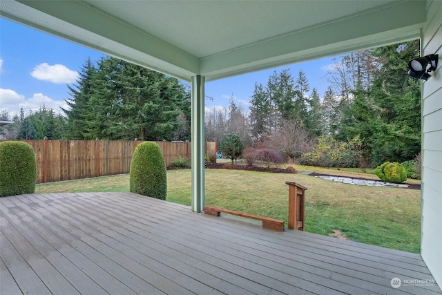 wooden terrace with a yard