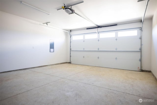 garage with electric panel and a garage door opener