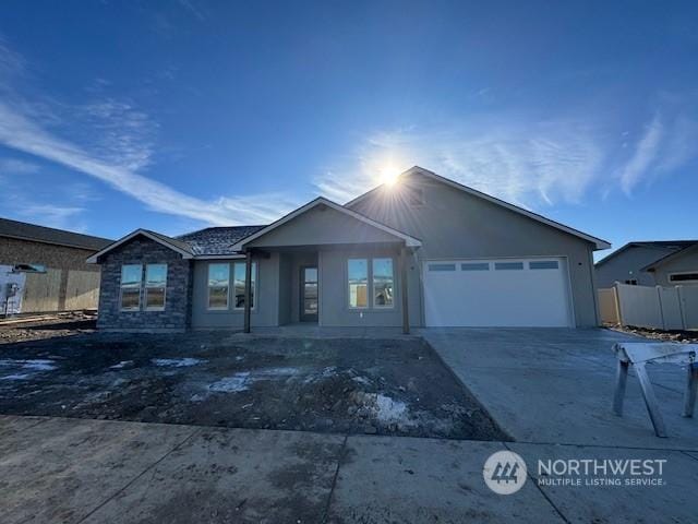 view of front of property with a garage