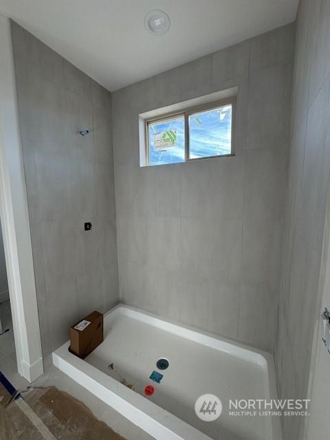 bathroom with walk in shower