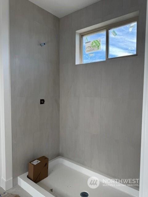 bathroom with a shower