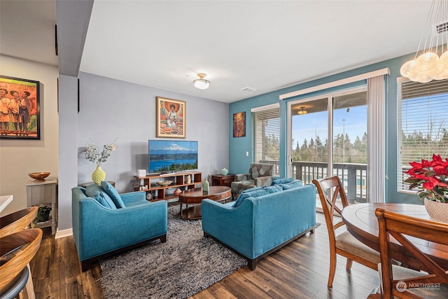 living room with dark hardwood / wood-style floors