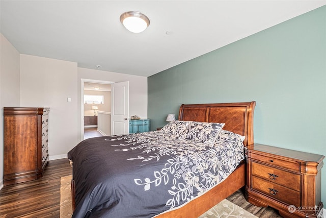 bedroom featuring dark wood-type flooring