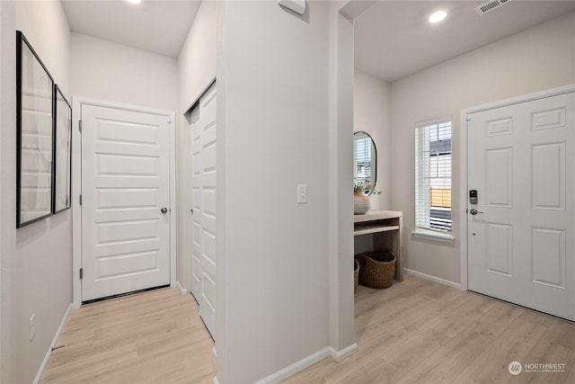 entrance foyer featuring light wood-type flooring