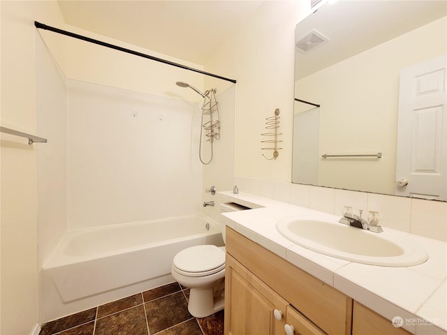 full bathroom with decorative backsplash, vanity, toilet, and washtub / shower combination