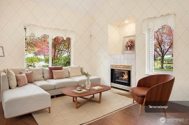 living room featuring tile walls and a tile fireplace