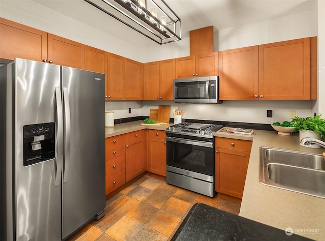 kitchen with sink and stainless steel appliances