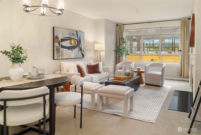 carpeted living room featuring a notable chandelier