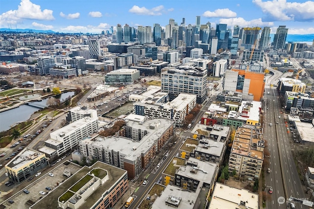 property's view of city featuring a water view