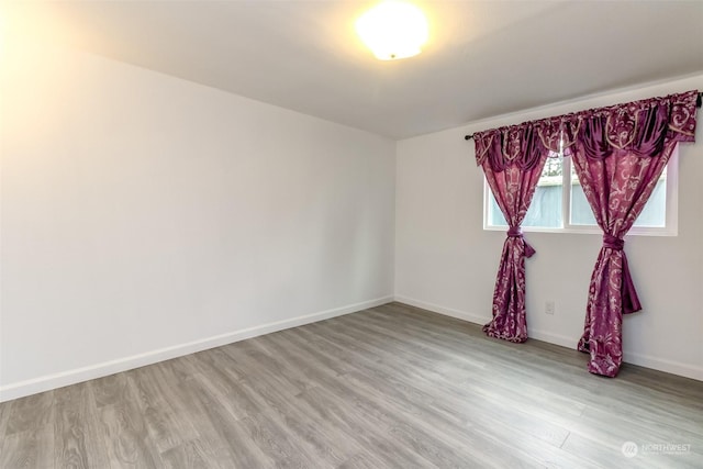 empty room featuring light wood-type flooring