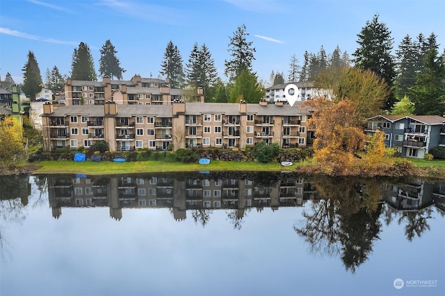 view of property with a water view