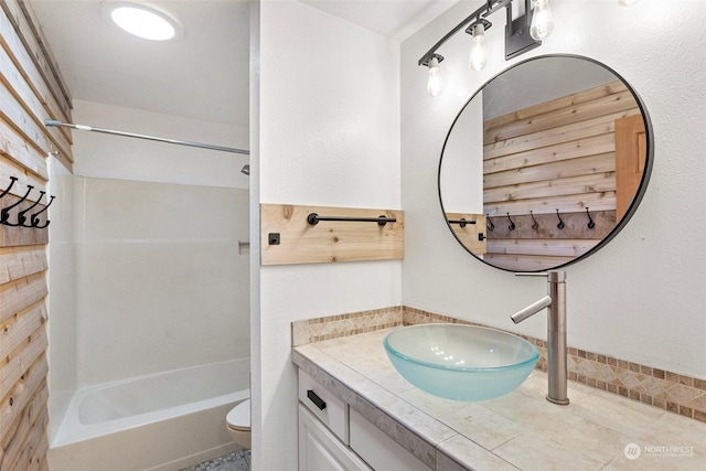 full bathroom with tile patterned flooring, vanity, toilet, and shower / bathtub combination