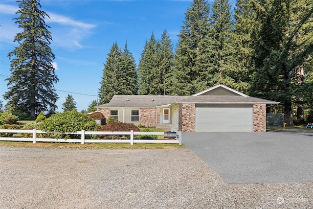 ranch-style home with a garage