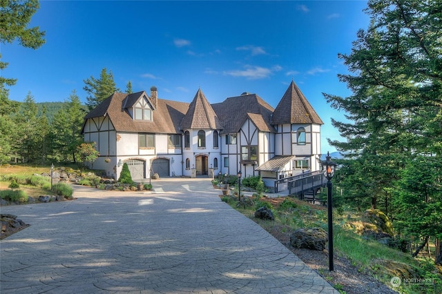 tudor house with a garage