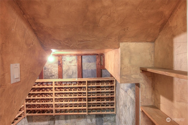 wine area featuring wooden ceiling