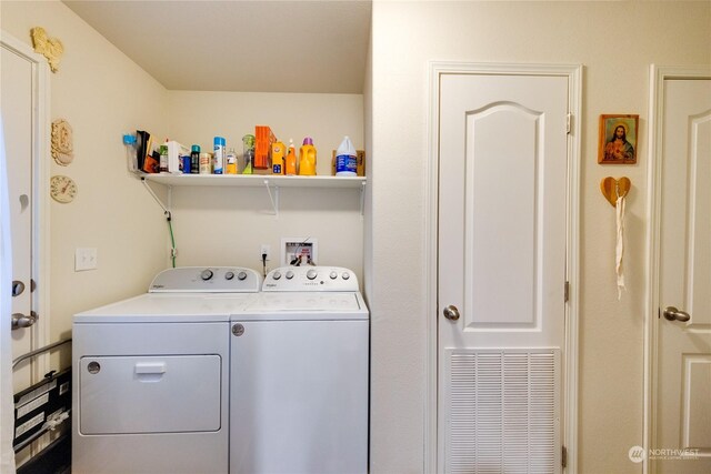 laundry room featuring independent washer and dryer