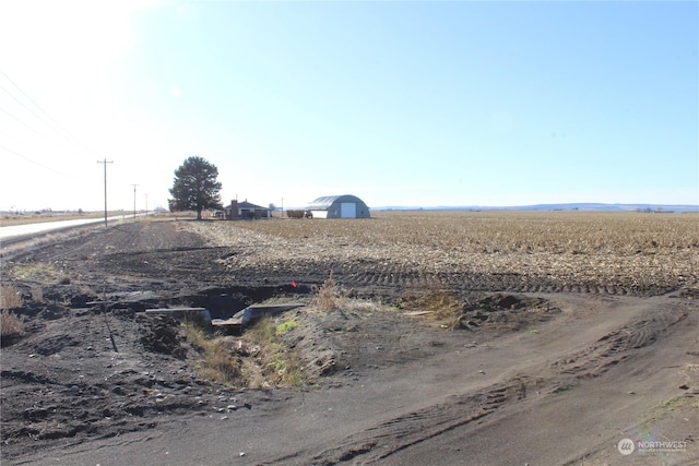 view of road featuring a rural view