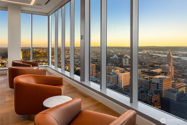 sunroom / solarium featuring a view of city